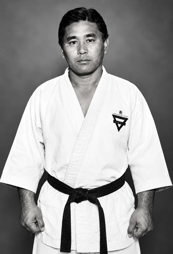 Portrait of Sensei Ken Kawachi in judo attire, Hawaiian judo champion who introduced the wrist-action concept to Wally Jay