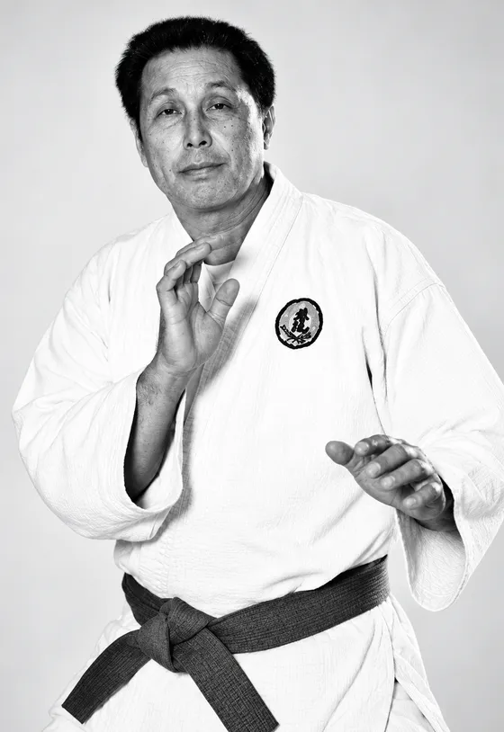Black-and-white portrait of Professor Wally Jay in a judogi, founder of Small Circle Jujitsu